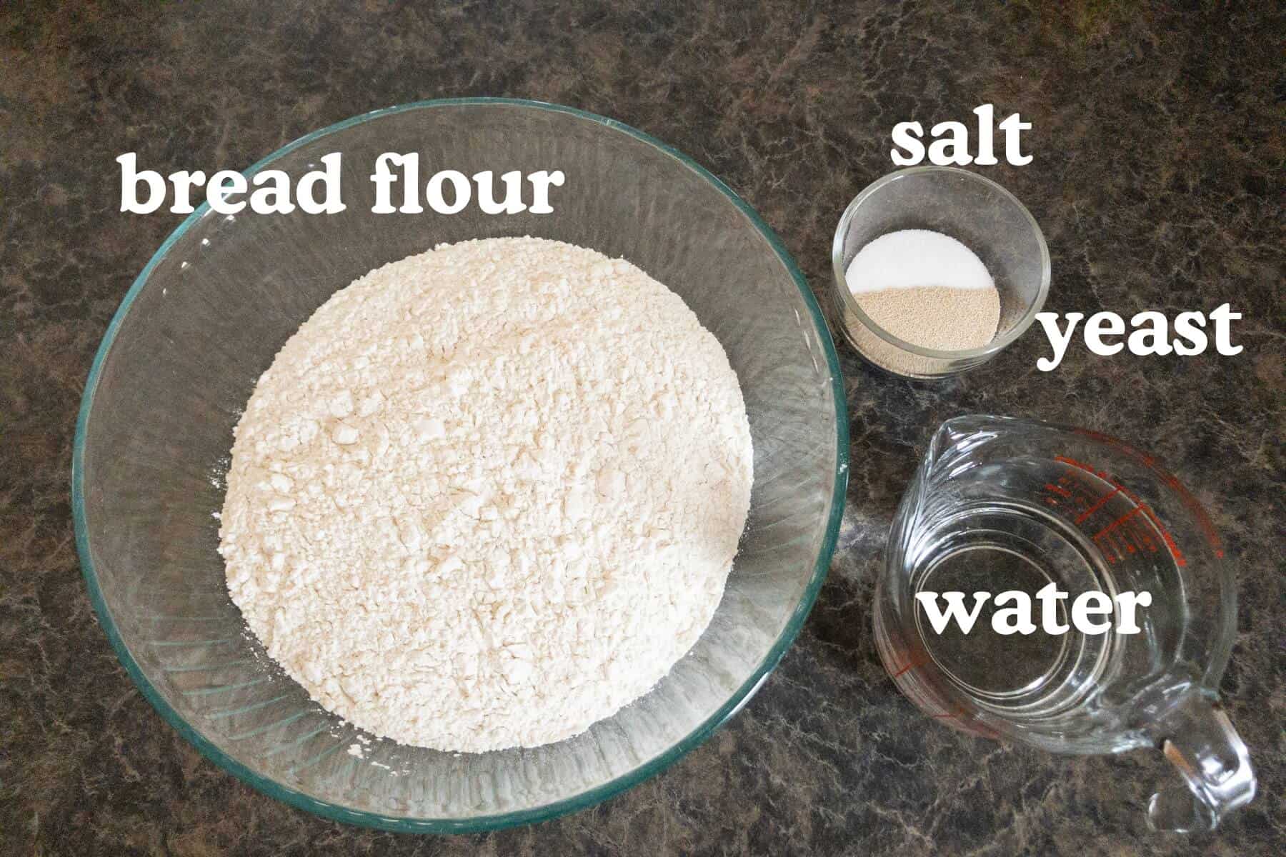 Ingredients for artisan bread - bread flour, salt, yeast, and water.